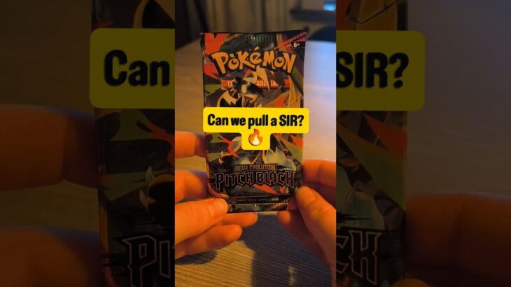opening a Pókemon pack of pitch black